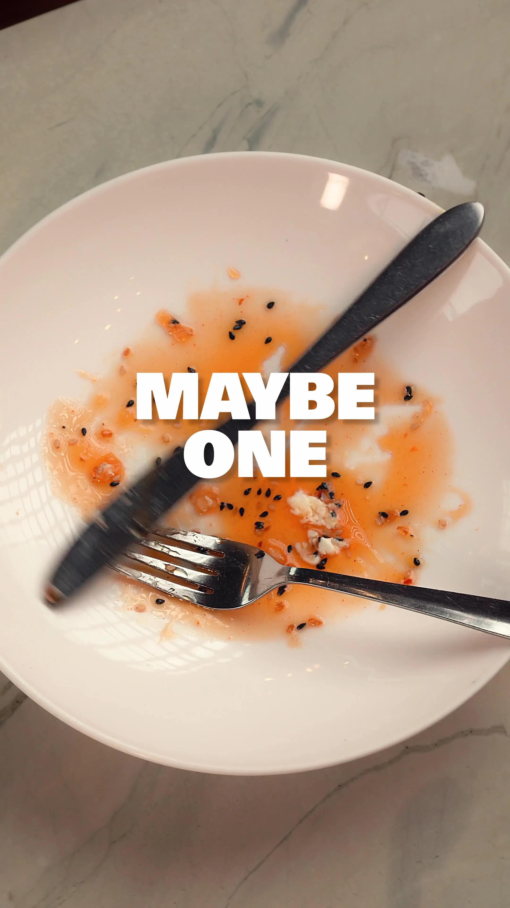 A plate with fork marks and a sauce drizzle, captioned "Maybe One More."