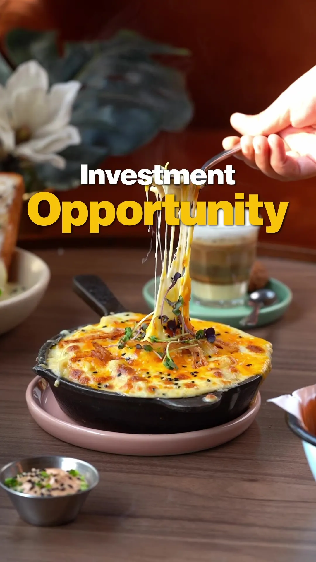 A cheesy baked pasta dish in a skillet, captioned "Investment Opportunity."